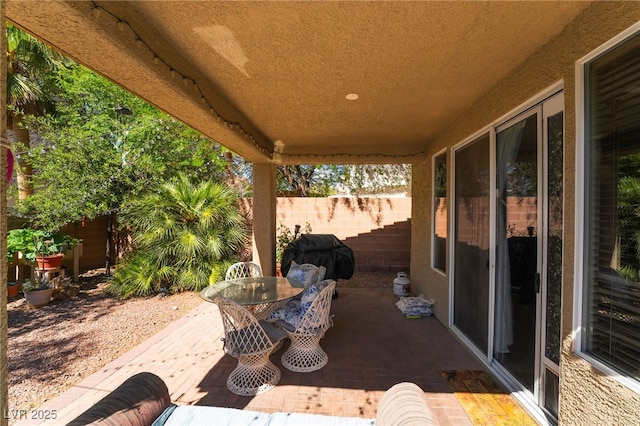 9513 Perennial View Ave, Las Vegas, NV 89148 - view of patio featuring fence and a grill
