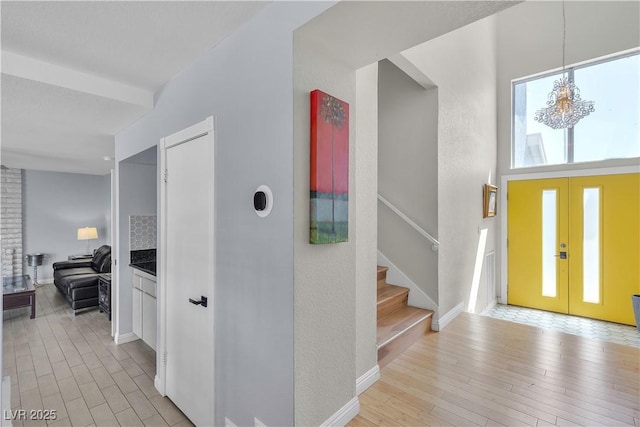 1808 Piccolo Way, Las Vegas, NV 89146 - foyer featuring light wood finished floors, stairs, and baseboards