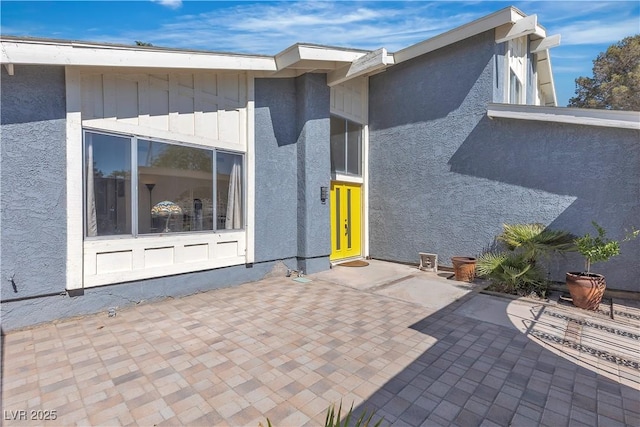 1808 Piccolo Way, Las Vegas, NV 89146 - view of exterior entry featuring a patio and stucco siding