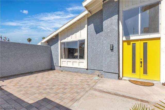 1808 Piccolo Way, Las Vegas, NV 89146 - view of exterior entry featuring french doors, stucco siding, and a patio area