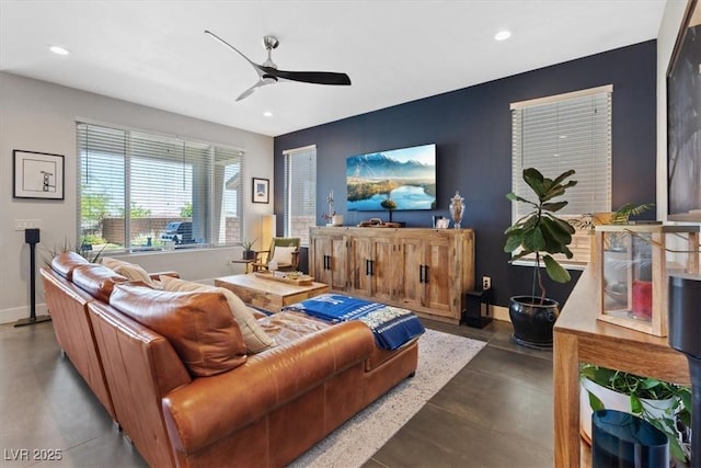10954 Free Flow Pl, Las Vegas, NV 89138 - living area featuring concrete flooring, ceiling fan, recessed lighting, and baseboards