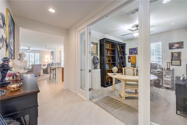 8269 Skye Peak St, Las Vegas, NV 89166 - hallway with a desk, light tile patterned floors, baseboards, and recessed lighting