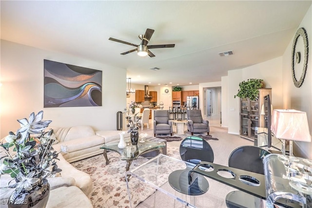 8269 Skye Peak St, Las Vegas, NV 89166 - living area with ceiling fan, light colored carpet, and recessed lighting