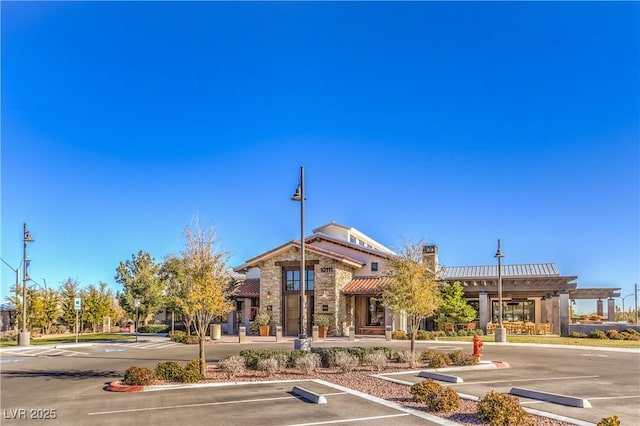 8269 Skye Peak St, Las Vegas, NV 89166 - view of property featuring uncovered parking