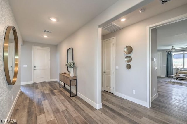 1220 Eva Creek Dr Unit 35, North Las Vegas, NV 89084 - hallway with wood finished floors, recessed lighting, and baseboards