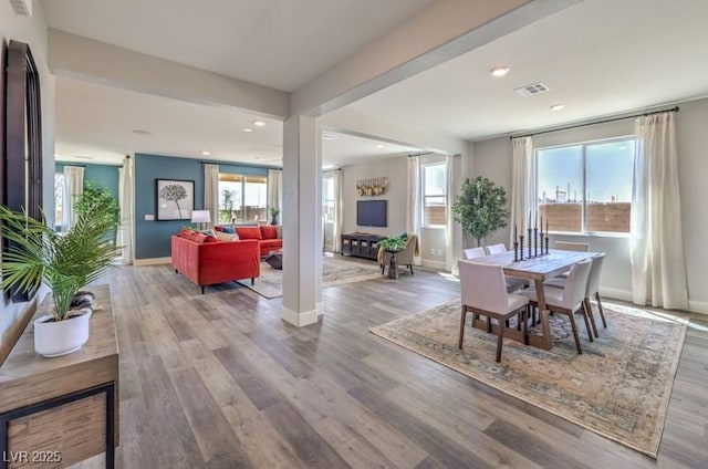 1220 Eva Creek Dr Unit 35, North Las Vegas, NV 89084 - dining space with wood finished floors, baseboards, and recessed lighting