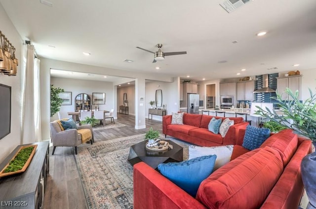1220 Eva Creek Dr Unit 35, North Las Vegas, NV 89084 - living area featuring wood finished floors, recessed lighting, ceiling fan, and baseboards