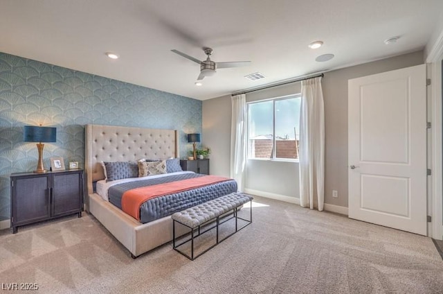 1220 Eva Creek Dr Unit 35, North Las Vegas, NV 89084 - bedroom featuring wallpapered walls, baseboards, carpet, an accent wall, and a ceiling fan
