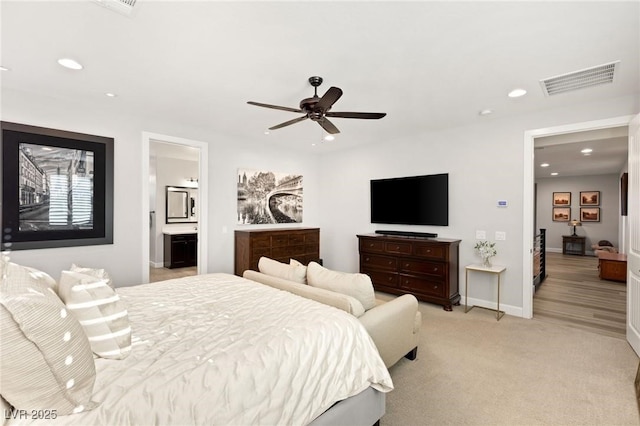 352 Dandelion Brook Ct, Las Vegas, NV 89148 - bedroom featuring recessed lighting, light colored carpet, ensuite bath, baseboards, and a ceiling fan