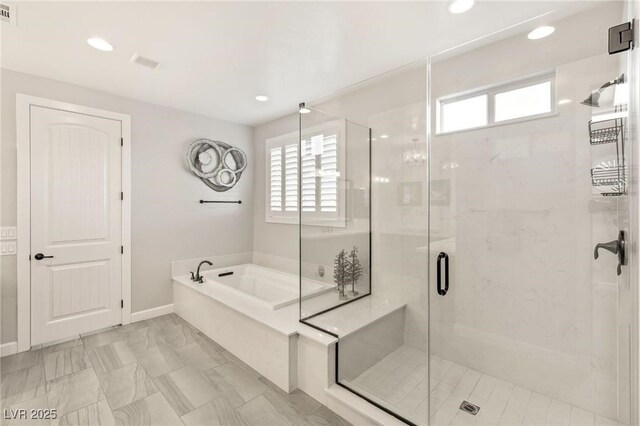 352 Dandelion Brook Ct, Las Vegas, NV 89148 - full bath with plenty of natural light, a bath, marble look tile flooring, a stall shower, and recessed lighting