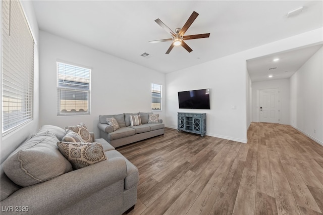 485 Pebble Run Ave, Henderson, NV 89011 - living room featuring a ceiling fan, light wood-style floors, baseboards, and recessed lighting