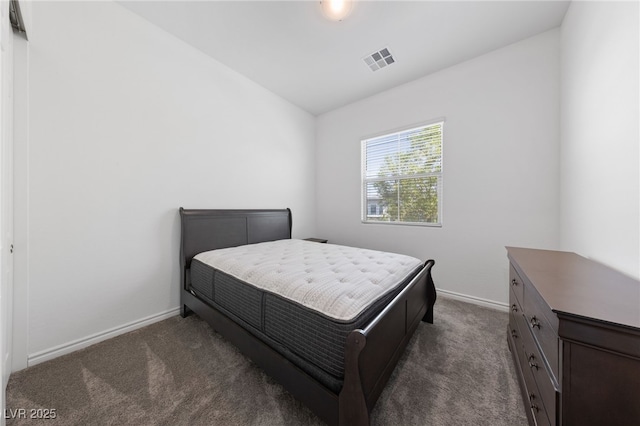 485 Pebble Run Ave, Henderson, NV 89011 - bedroom featuring dark carpet, baseboards, and vaulted ceiling