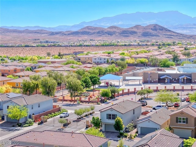 aerial view of residential area with a mountain backdrop