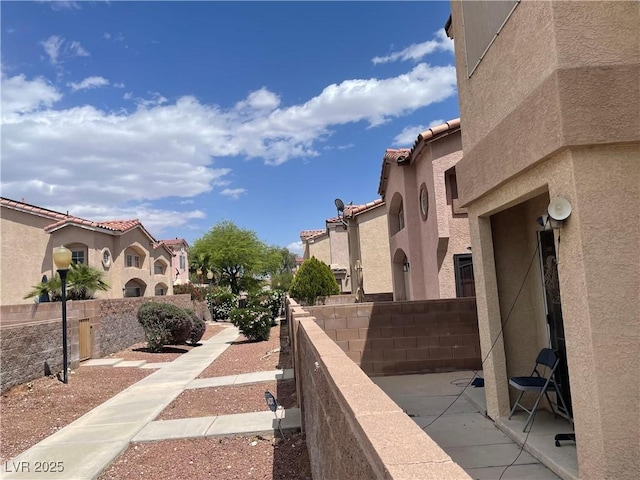 surrounding community featuring fence and a residential view