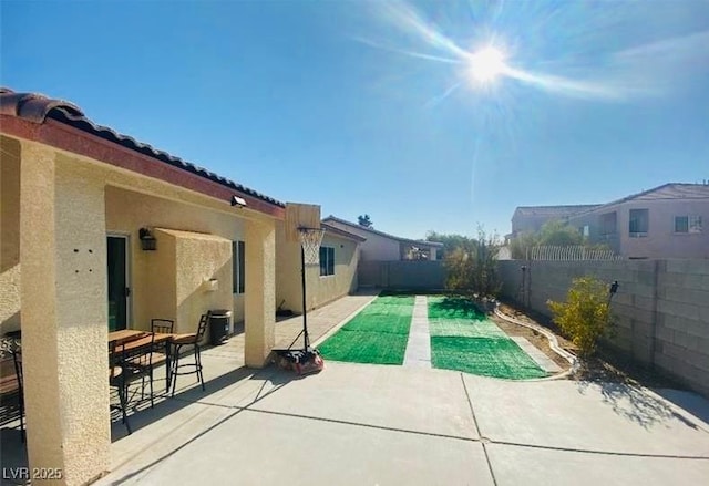 3301 W Colton Ave, North Las Vegas, NV 89032 - fenced backyard with a patio