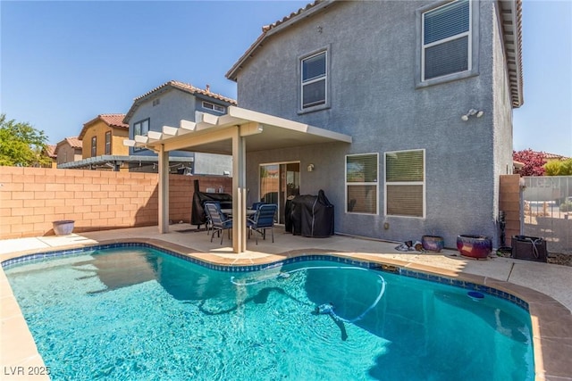 11739 Village Arbor St, Las Vegas, NV 89183 - view of pool featuring a patio, a fenced backyard, and grilling area