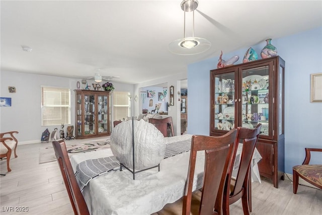 11739 Village Arbor St, Las Vegas, NV 89183 - dining space featuring light wood-style flooring and baseboards