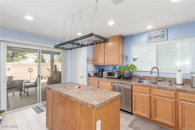 11739 Village Arbor St, Las Vegas, NV 89183 - kitchen with dishwasher, a sink, healthy amount of natural light, a kitchen island, and recessed lighting
