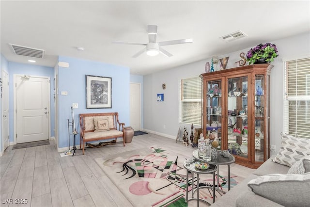 11739 Village Arbor St, Las Vegas, NV 89183 - sitting room featuring a ceiling fan, light wood-style floors, and baseboards