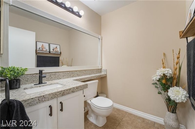 4209 Glass Lantern Dr, North Las Vegas, NV 89032 - bathroom featuring toilet, vanity, baseboards, and tile patterned floors