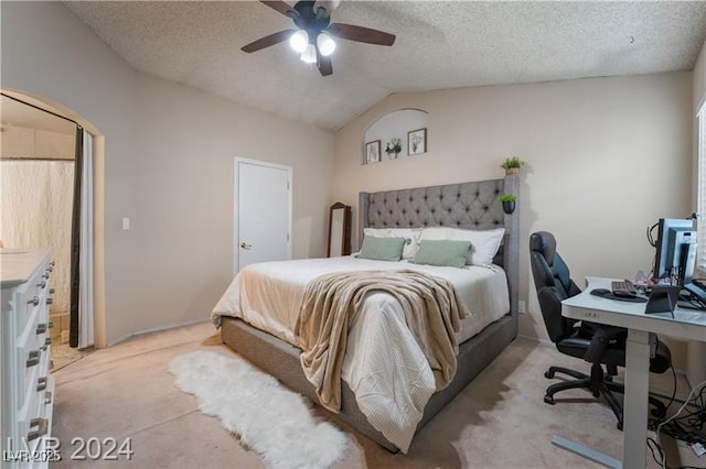 4209 Glass Lantern Dr, North Las Vegas, NV 89032 - bedroom with light carpet, an office area, lofted ceiling, a ceiling fan, and a textured ceiling