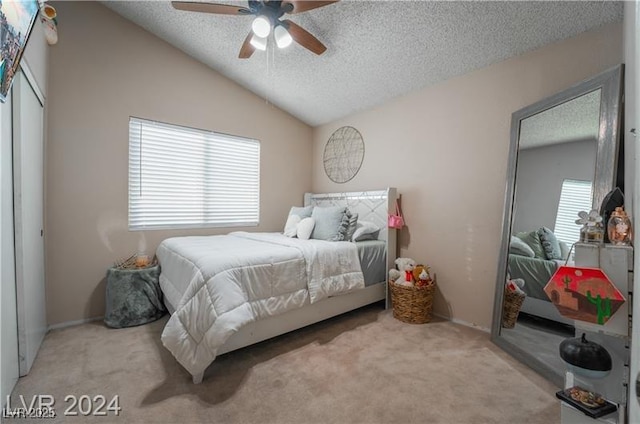 4209 Glass Lantern Dr, North Las Vegas, NV 89032 - bedroom featuring carpet flooring, a textured ceiling, lofted ceiling, ceiling fan, and a closet