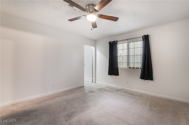 6711 W Charleston Blvd Unit 2, Las Vegas, NV 89146 - unfurnished room with carpet flooring, baseboards, and a ceiling fan