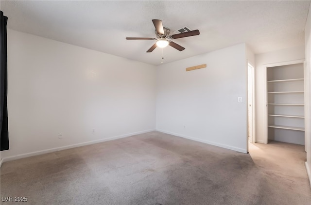 6711 W Charleston Blvd Unit 2, Las Vegas, NV 89146 - carpeted spare room with ceiling fan and baseboards