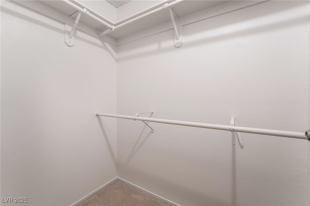 6711 W Charleston Blvd Unit 2, Las Vegas, NV 89146 - spacious closet featuring carpet flooring