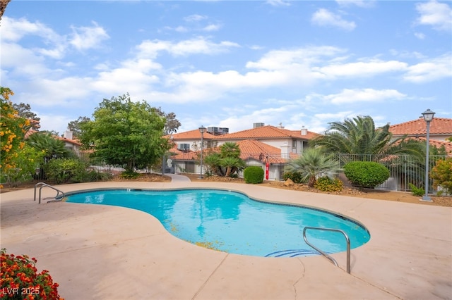 6711 W Charleston Blvd Unit 2, Las Vegas, NV 89146 - swimming pool with a patio area and fence
