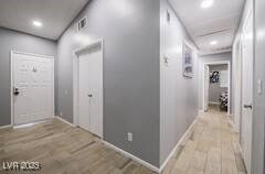 1012 Greystone Dr, Las Vegas, NV 89108 - corridor featuring light wood-type flooring, recessed lighting, and baseboards