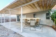 1012 Greystone Dr, Las Vegas, NV 89108 - view of patio with outdoor dining area