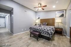 1012 Greystone Dr, Las Vegas, NV 89108 - bedroom with wood finished floors, baseboards, and recessed lighting