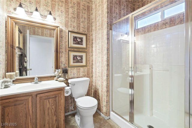 4114 Jessica Marie St, North Las Vegas, NV 89032 - bathroom featuring wallpapered walls, a stall shower, toilet, and vanity