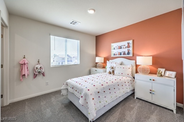 bedroom featuring carpet and baseboards