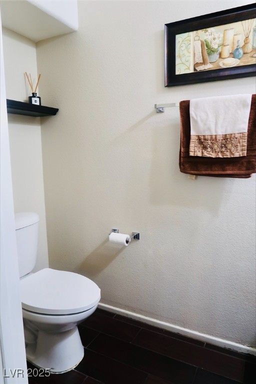7257 Early Pioneer Ave, Las Vegas, NV 89129 - bathroom with toilet and baseboards