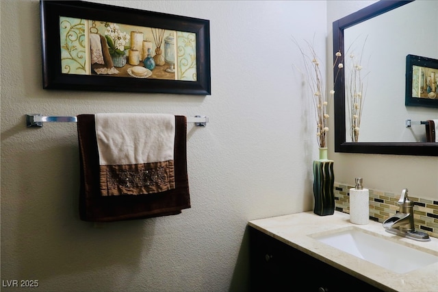 7257 Early Pioneer Ave, Las Vegas, NV 89129 - bathroom featuring decorative backsplash and vanity