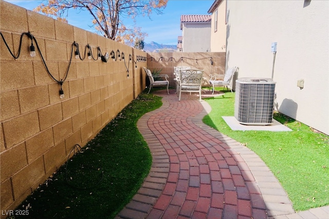 7257 Early Pioneer Ave, Las Vegas, NV 89129 - fenced backyard with central AC and a patio