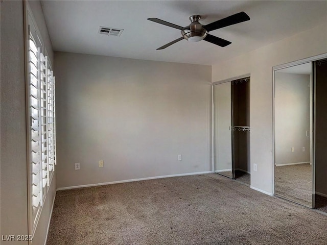 7257 Early Pioneer Ave, Las Vegas, NV 89129 - unfurnished bedroom with carpet, multiple closets, baseboards, and a ceiling fan