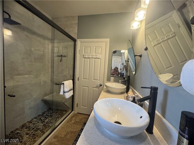 640 House Blend Ln, Henderson, NV 89052 - full bath featuring a stall shower, baseboards, and double vanity