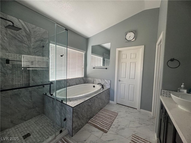 640 House Blend Ln, Henderson, NV 89052 - full bath with marble finish floors, lofted ceiling, a stall shower, a bath, and vanity