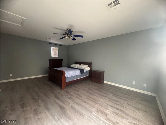 640 House Blend Ln, Henderson, NV 89052 - bedroom featuring baseboards, wood finished floors, and ceiling fan