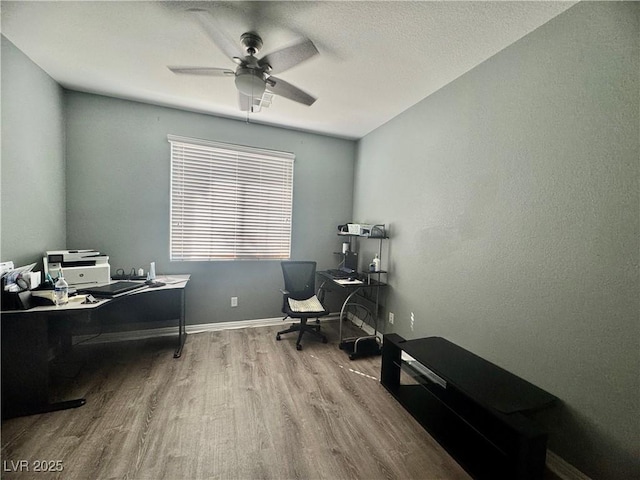 640 House Blend Ln, Henderson, NV 89052 - office space featuring wood finished floors, a ceiling fan, and baseboards