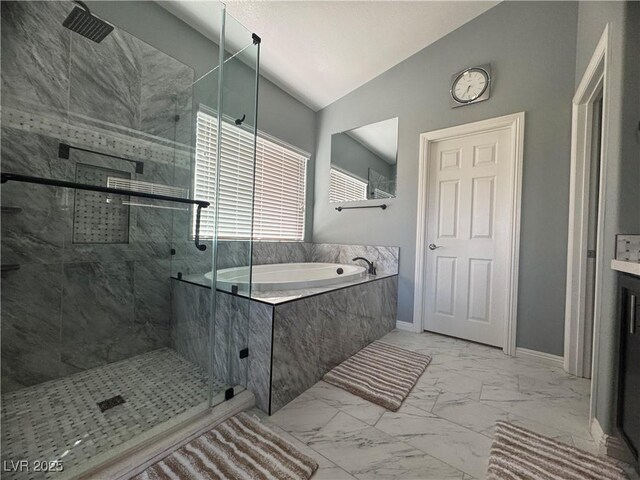 640 House Blend Ln, Henderson, NV 89052 - full bath with marble finish flooring, a shower stall, a bath, lofted ceiling, and baseboards