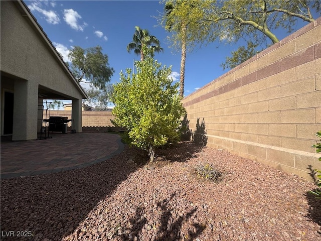 640 House Blend Ln, Henderson, NV 89052 - fenced backyard with a patio