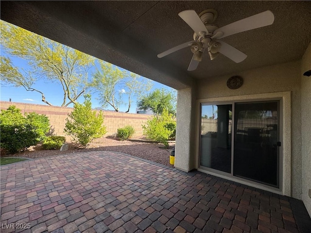 640 House Blend Ln, Henderson, NV 89052 - view of patio featuring a fenced backyard and a ceiling fan