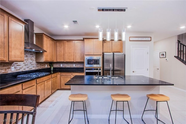 8021 Adelaide Hills St, Las Vegas, NV 89113 - kitchen with wall chimney range hood, stainless steel appliances, light tile patterned floors, tasteful backsplash, and a breakfast bar area