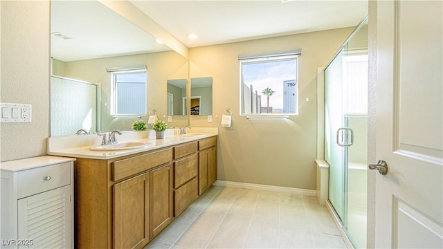 8021 Adelaide Hills St, Las Vegas, NV 89113 - full bathroom with healthy amount of natural light, a stall shower, double vanity, and baseboards