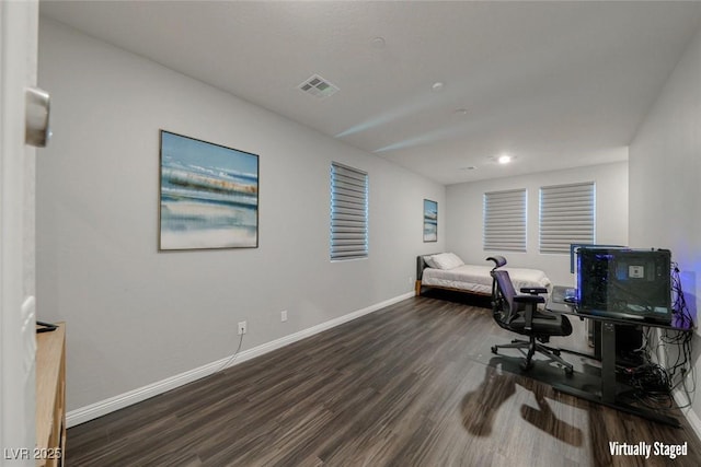 office featuring wood finished floors and baseboards