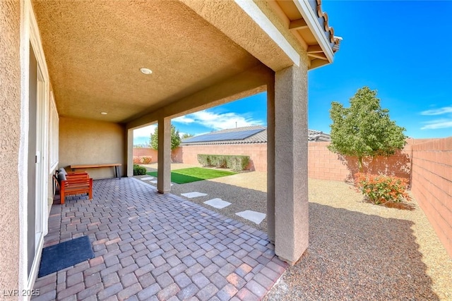 view of patio with a fenced backyard